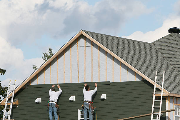 Professional Siding Installation technician working in Morral, OH